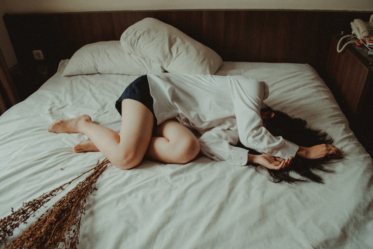 Woman performing evening stretches for better sleep